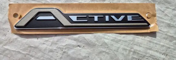 Ford Focus Fender model badge letters J1BZ-16720-A