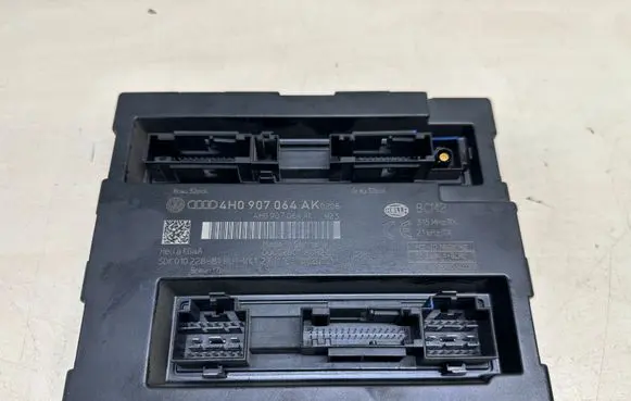 Volkswagen Touareg II Comfort/convenience module 4H0907064AK