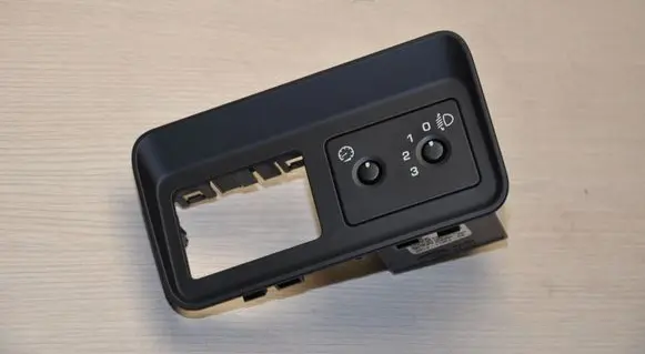 Headlight level height control switch