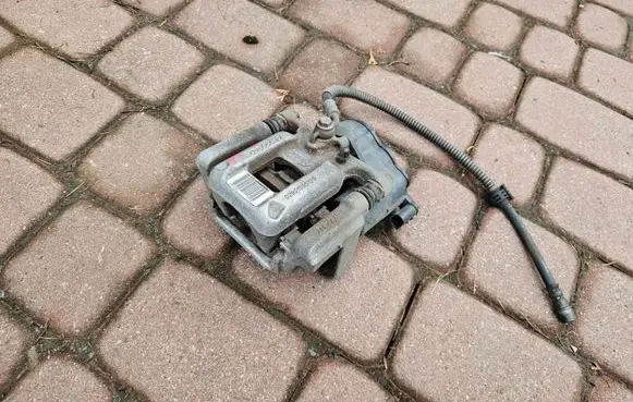 Opel Corsa F Rear brake caliper 9819059480