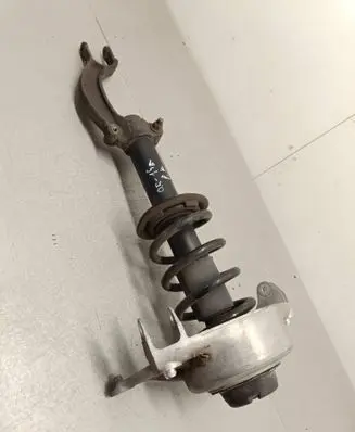 Front shock absorber with coil spring