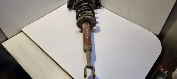 Front shock absorber with coil spring