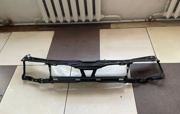 Top upper radiator support slam panel