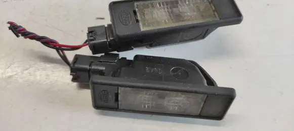 Nissan Primera Number plate light 05A5 153012