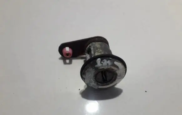 Nissan Almera Front door lock (next to the handle) 