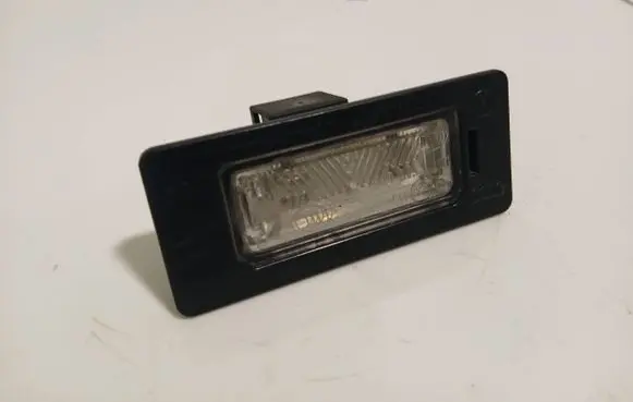 Volkswagen PASSAT B6 Number plate light 8T0943021