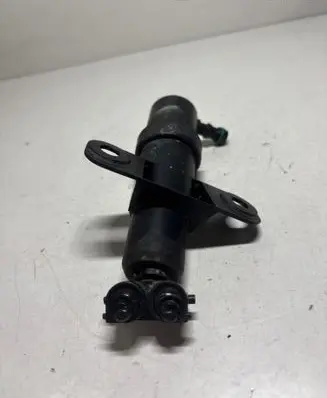 Headlight washer spray nozzle