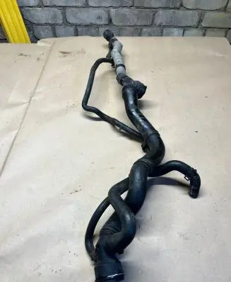 Volkswagen PASSAT B6 Engine coolant pipe/hose 1K0122291A PA6GF30