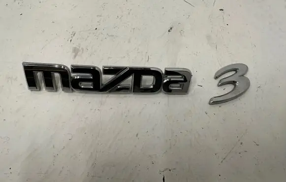 Mazda 3 I Manufacturers badge/model letters 