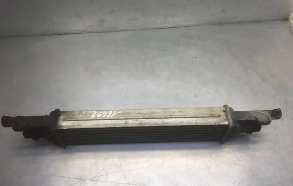 Opel Corsa D Intercooler radiator 440926702