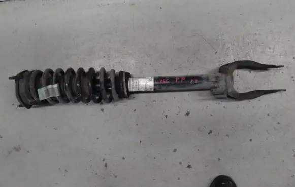 Mercedes-Benz ML W166 Front shock absorber with coil spring