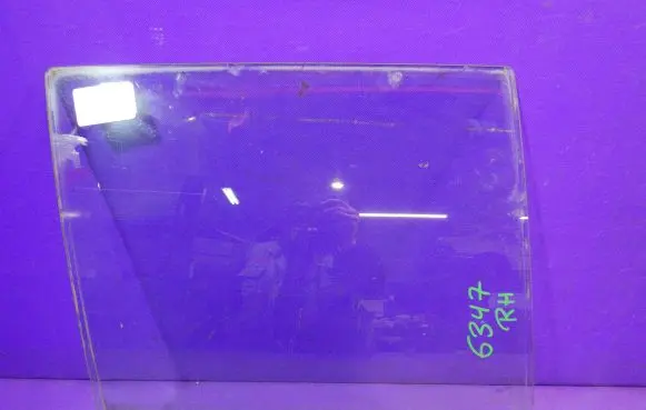 Mazda 323 Front door window glass four-door