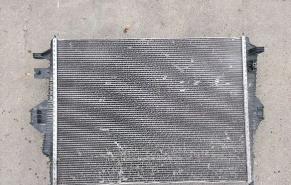Volkswagen Touareg II Intercooler radiator 7P0121253A