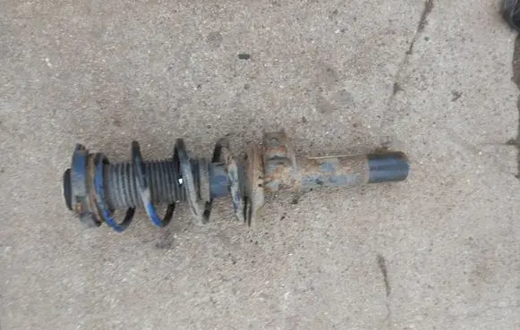 Volkswagen Touran I Front shock absorber with coil spring 1K0400053BD