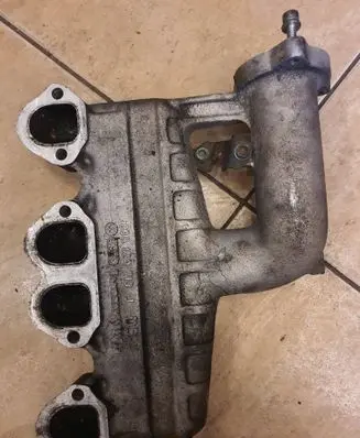Volkswagen Golf IV Intake manifold 038129713J