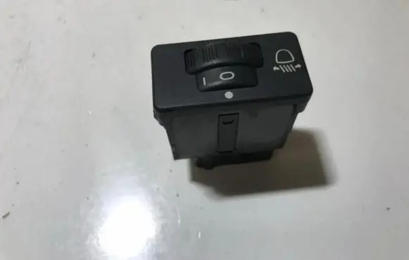 Headlight level height control switch