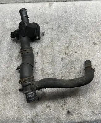 Volkswagen Touran I Engine coolant pipe/hose 06A121133AL