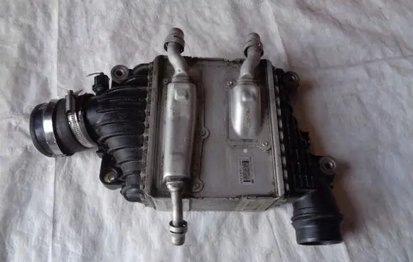 Jaguar XE Intercooler radiator GX736K775AB