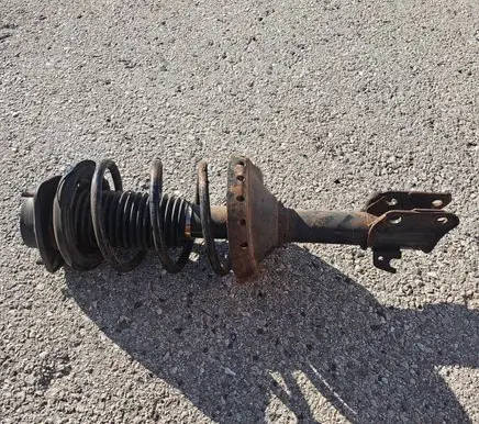 Subaru Forester SG Front shock absorber with coil spring
