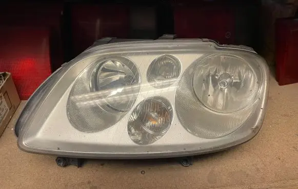 Volkswagen Touran I Headlight/headlamp 0301205201