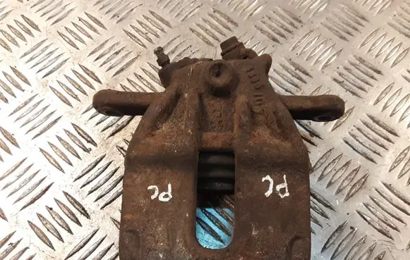 Nissan Note (E11) Front brake caliper
