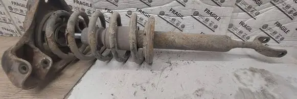 Volkswagen PASSAT B5 Front shock absorber with coil spring 252524