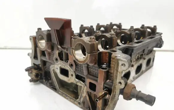 Opel Corsa D Engine head 55355430 F02207 7lj