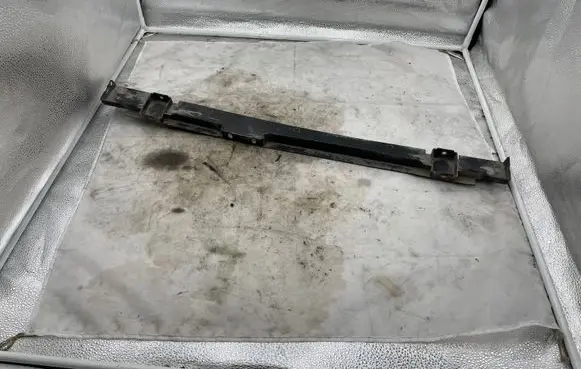 Top upper radiator support slam panel