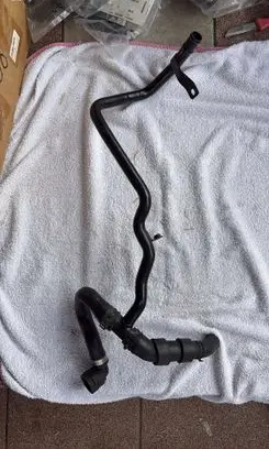 Volkswagen Golf VII Engine coolant pipe/hose 04L121065