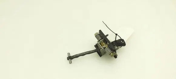Front door check strap stopper