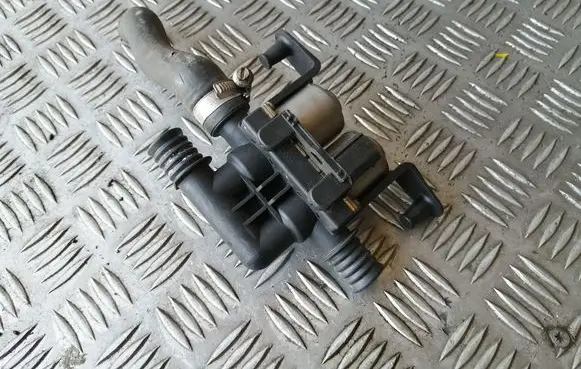 Coolant heater control valve