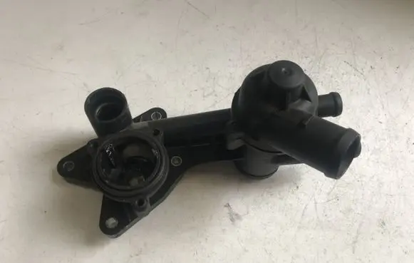 Thermostat/thermostat housing
