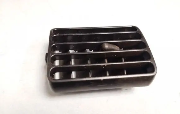Mazda 323 Dash center air vent grill