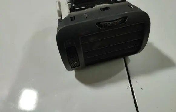 Dash center air vent grill