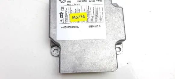 Volkswagen Touran I Airbag control unit/module 1T0909605C M5776