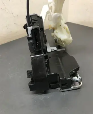 KIA Carens III Rear door lock 81410A4020