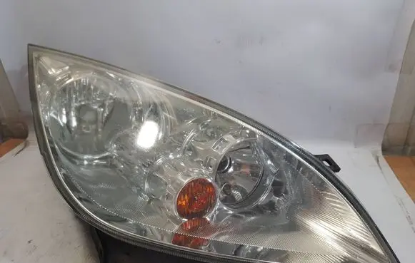 Mitsubishi Colt Headlight/headlamp MR957354 0301208202