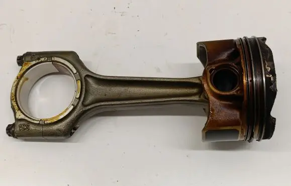 Piston with connecting rod