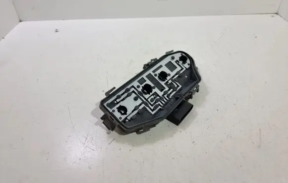 Tail light bulb cover holder