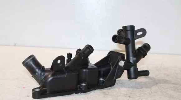 Thermostat/thermostat housing