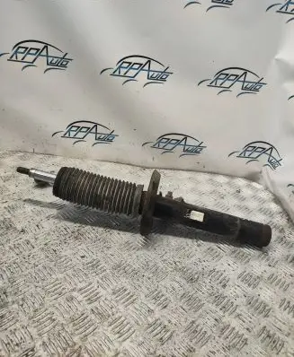 Volkswagen Caddy Front shock absorber/damper 1K0413031BA
