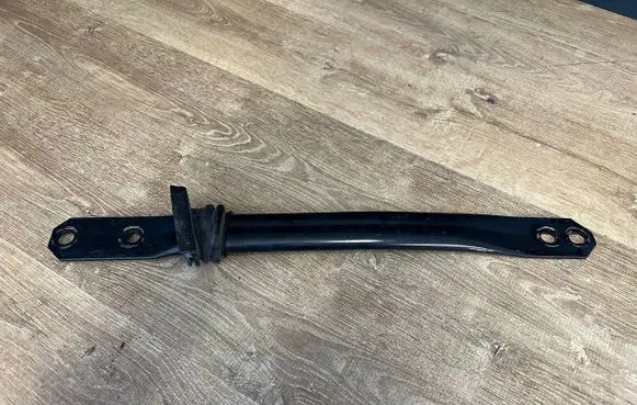 Radiator support slam panel bracket
