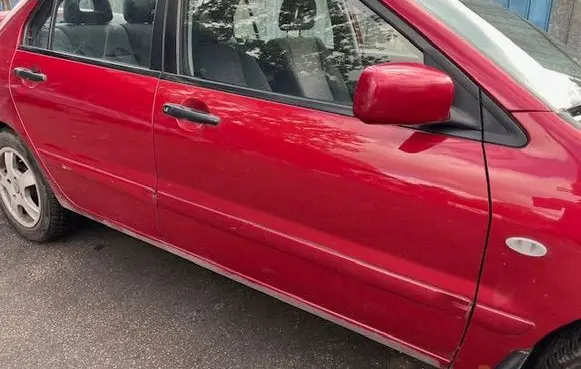Mitsubishi Lancer Front door
