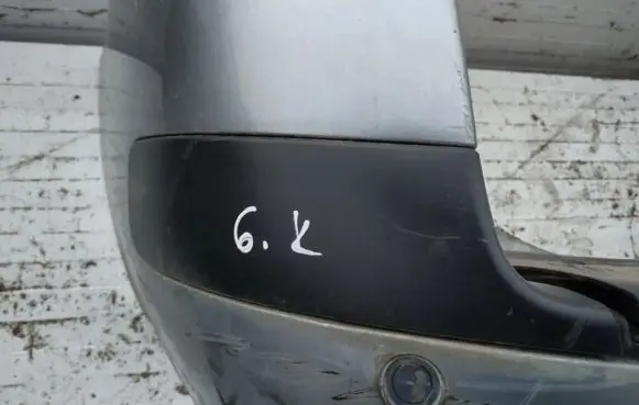 Rear bumper trim bar molding