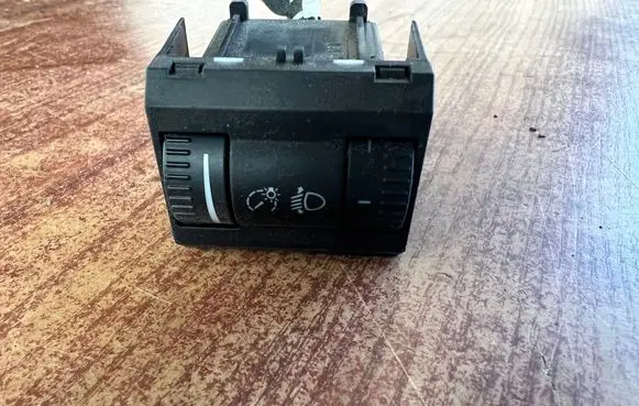 Headlight level height control switch