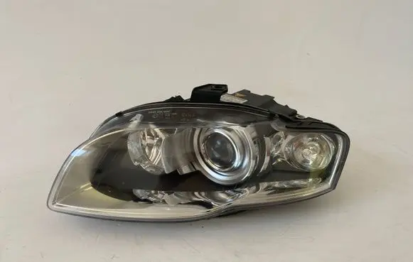 Volkswagen Touareg I Headlight/headlamp 8E0941033BM
