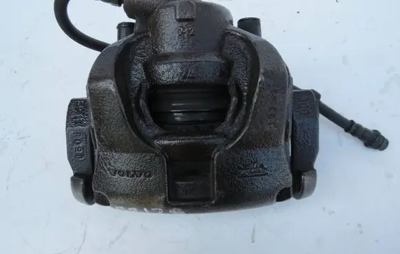 Volvo S60 Front Brake Caliper Pad/Carrier 