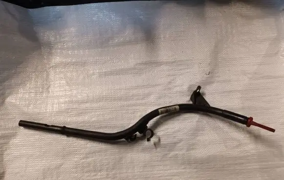 Oil level dip stick
