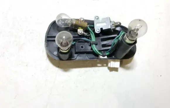 Mitsubishi Colt Tail light bulb cover holder