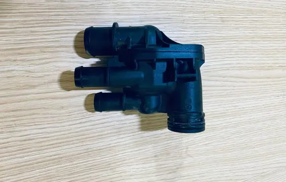 Thermostat/thermostat housing